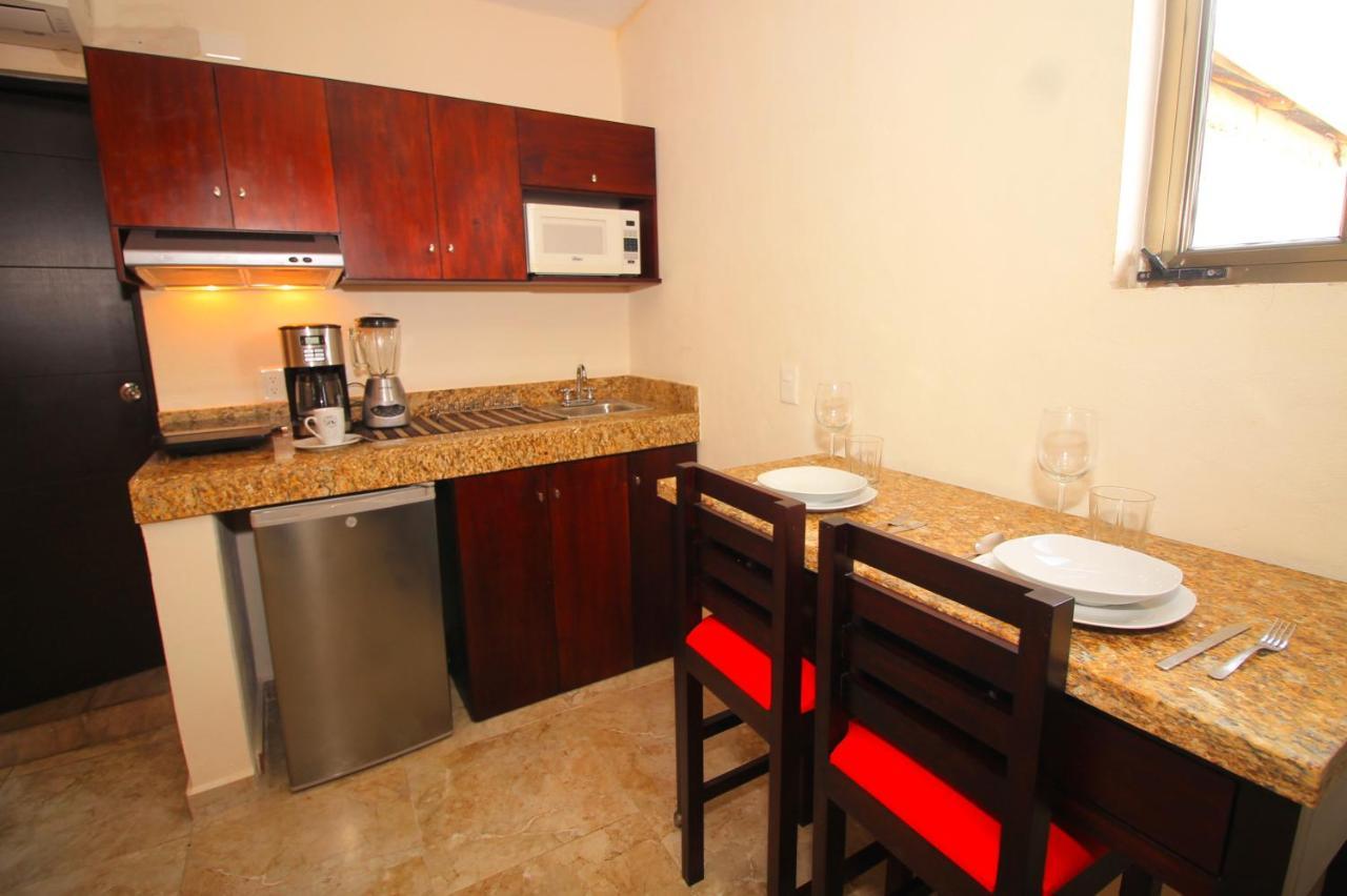 Papagayo Hotel Boutique Playa del Carmen Exterior photo A small kitchen