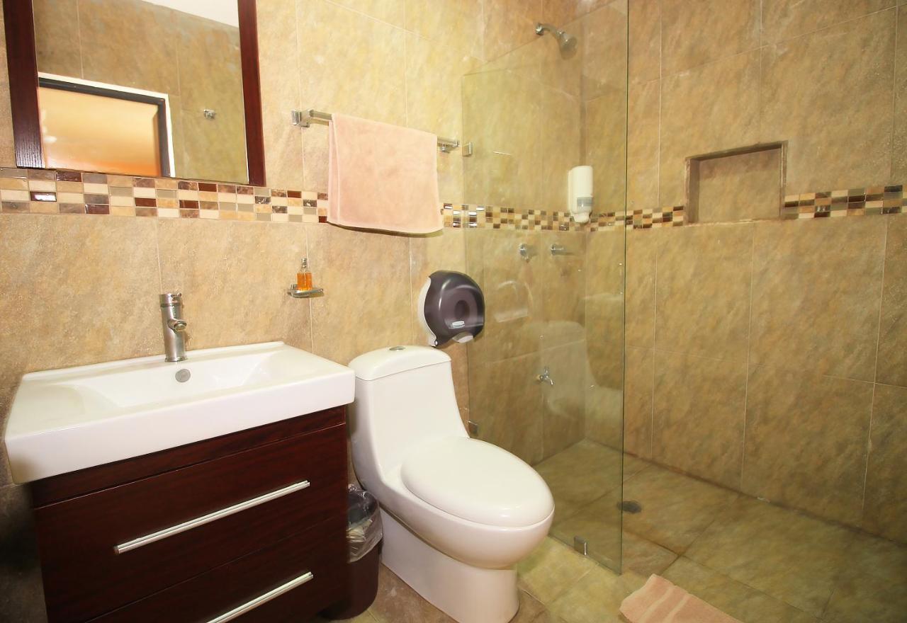 Papagayo Hotel Boutique Playa del Carmen Exterior photo Bathroom with a shower